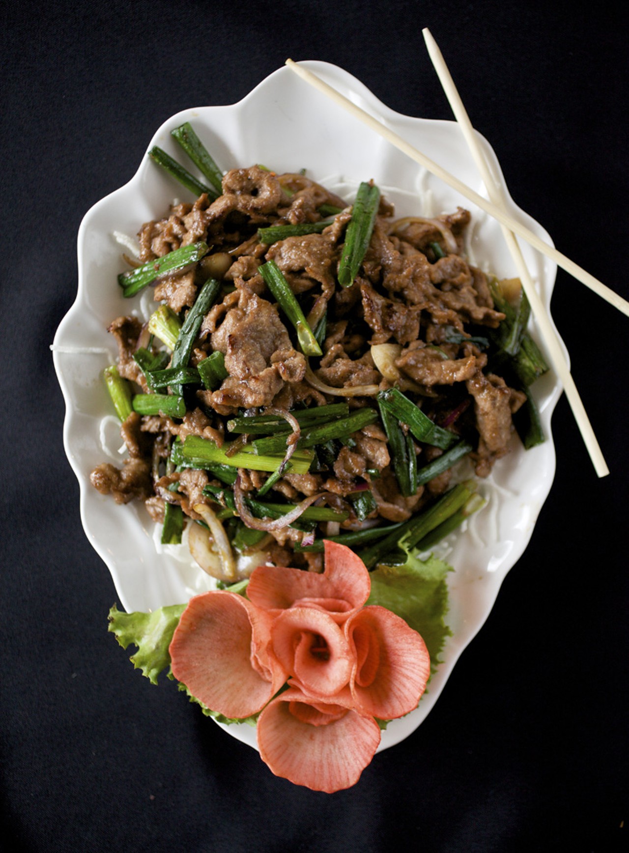 Ginger's Mongolian Beef is sauteed with scallions and red onions.
