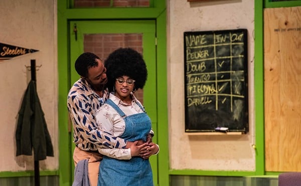 Rena (Alex Jay) and Youngblood (Olajuwon Davis) in Jitney at The Black Rep.