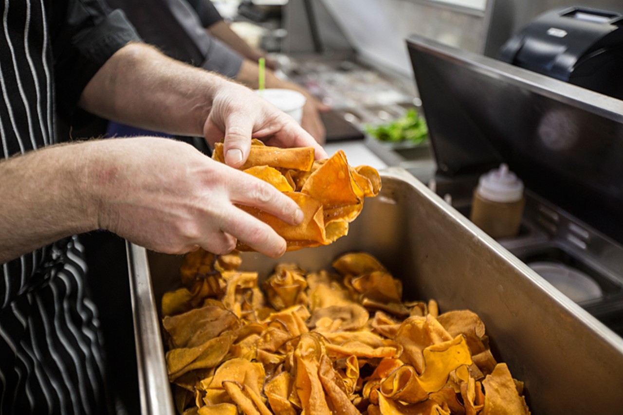 Sweet-potato chips are the base for the turkey leg nachos.