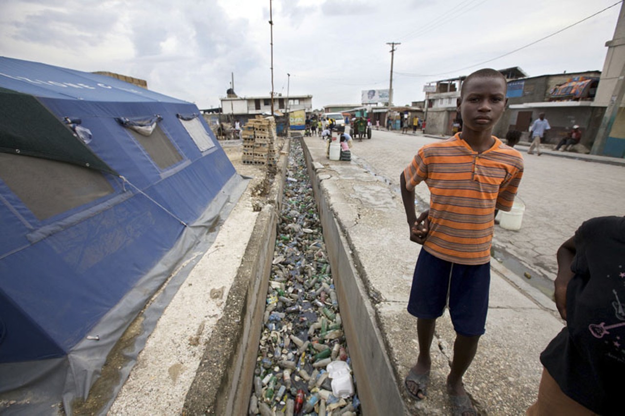 Trash-filled gutter, Port-au-Prince.