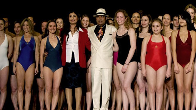 Famed yoga instructor Bikram Choudhury and his wife Rajashree Choudhury with some of the competitors at the 2010 International Yoga Asana Championships in Los Angeles. He is now suing his former student and right-hand man, Greg Gumucio, for copyright infringement.
