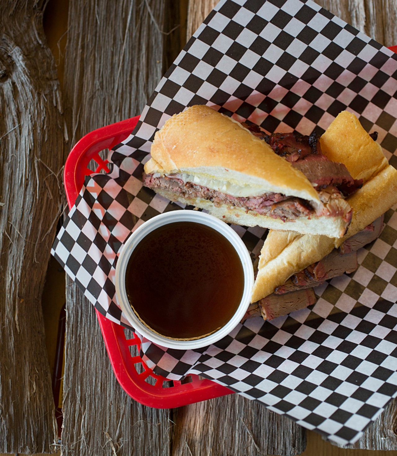 The "Dip": beef brisket on garlic French bread with provolone and jus for dipping.