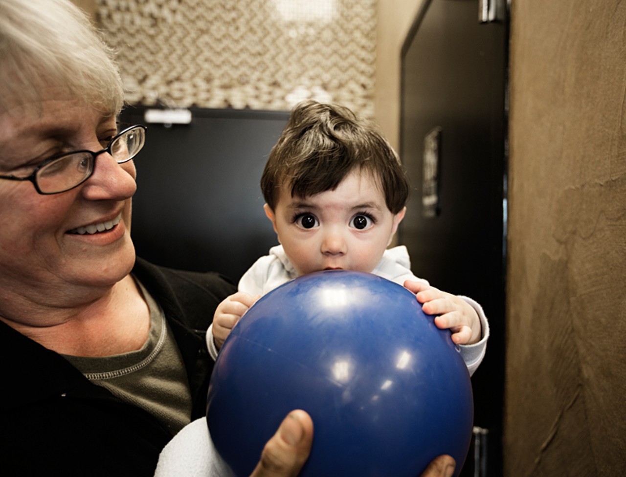 Owner Mary Randall with her nine-month0old grandson, Dominic. There are plenty of toys and games available for kids in the back of this family-friendly restaurant.