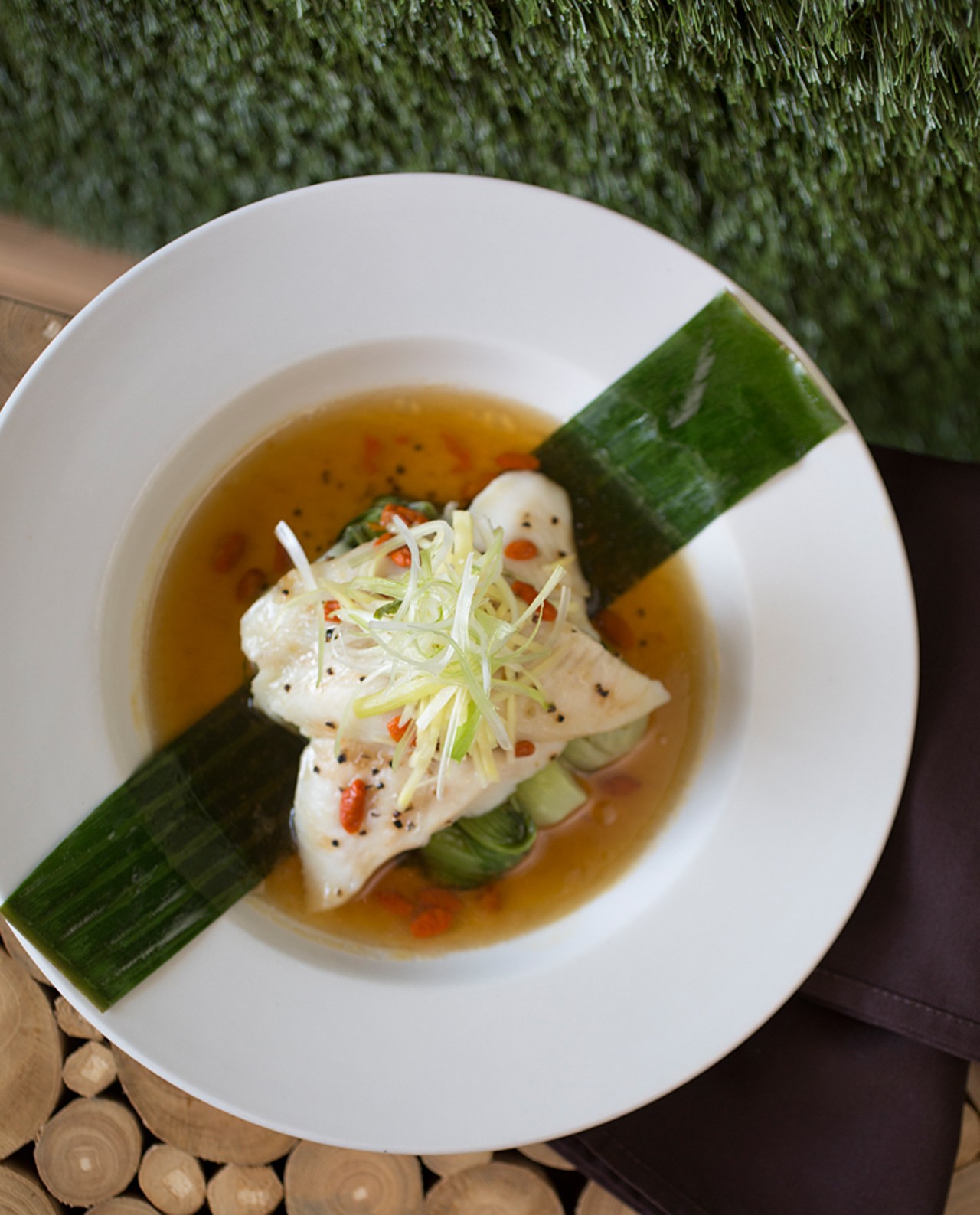 The "Goji Steamed Sole" brings filet of sole steamed with coriander soy-ginger sauce and baby bok choy.