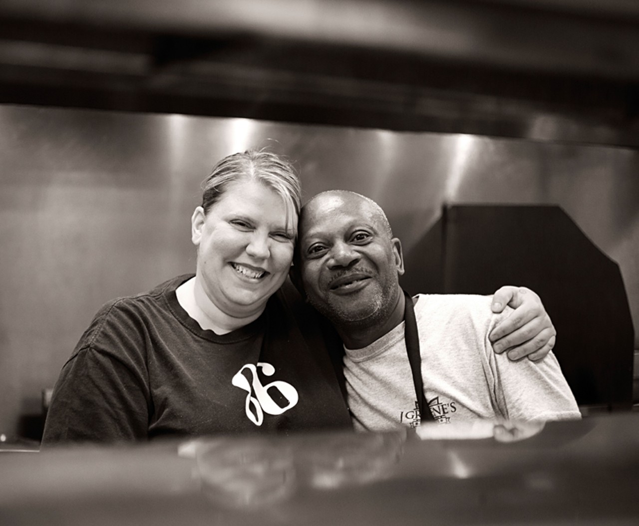 Owner and chef, Juliet Greene, with line cook "Shorty" in the restaurant's kitchen.
