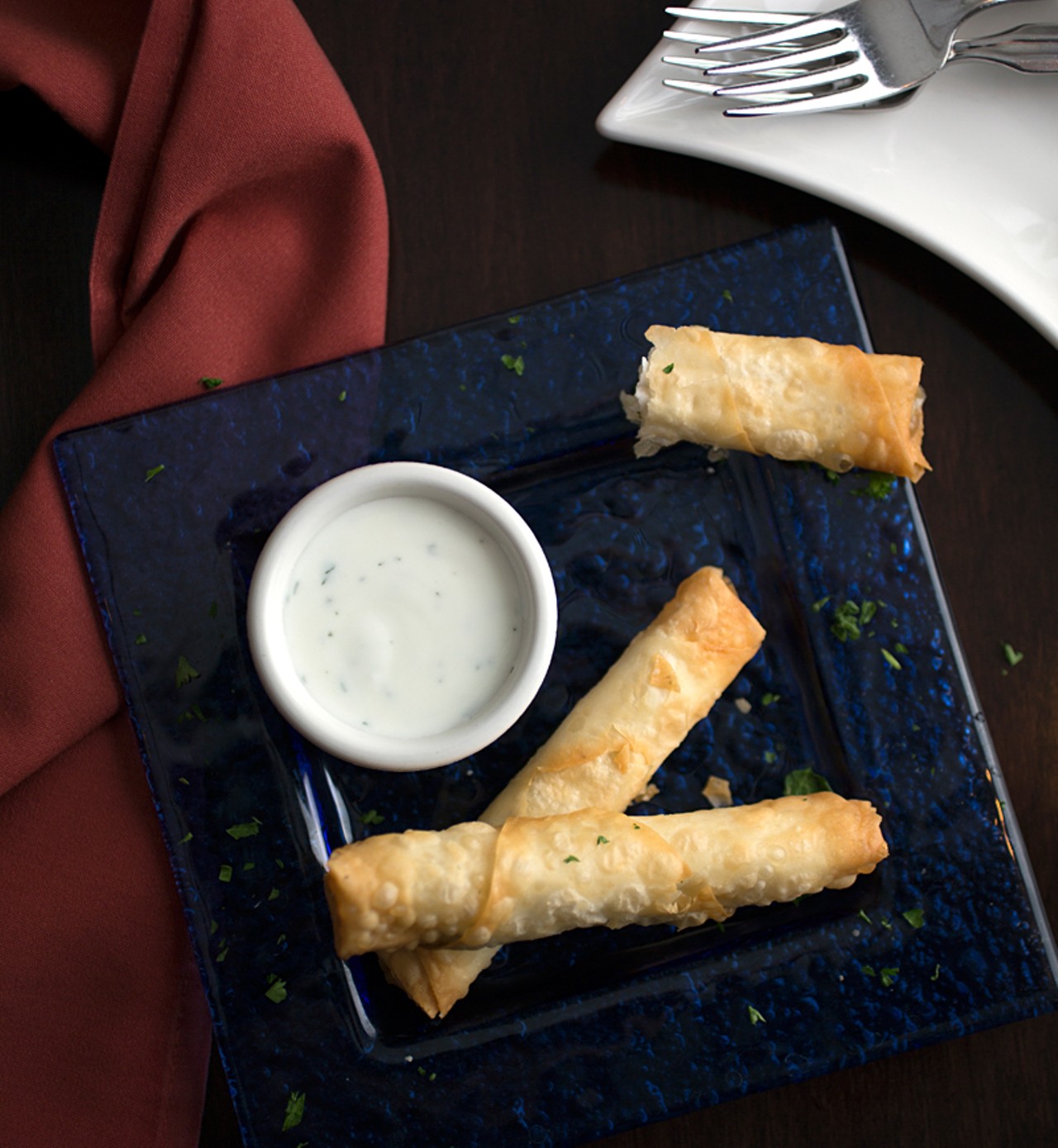 Phyllo cigars: phyllo dough stuffed with feta and herbs.