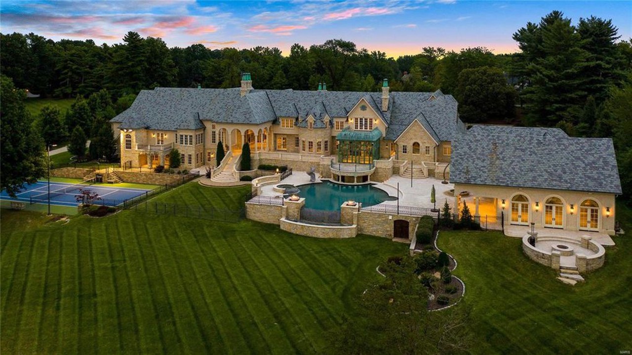 1705 N Woodlawn Ave, Ladue, MO 63124
$13,000,000
This is currently the most expensive house on the market in St. Louis. With seven bedrooms and thirteen bathrooms, there is much to explore on this property. In addition to 30,000 square feet of living space, there is a pool, a pond and an absolutely massive garage.
Visit the listing page here.
Photo credit: Realtor.com