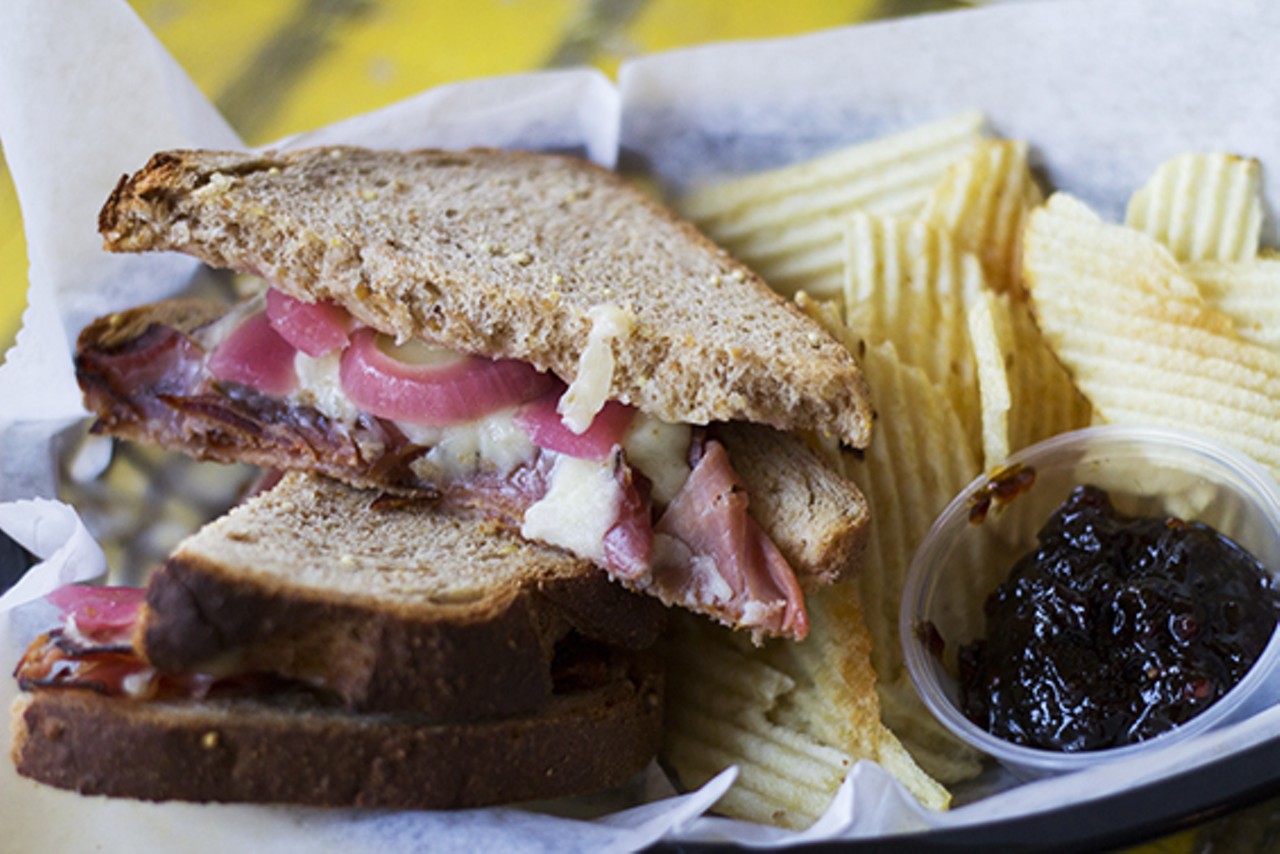A Black Forest ham sandwich with pickled onions, aged white cheddar and jalapeno jam.