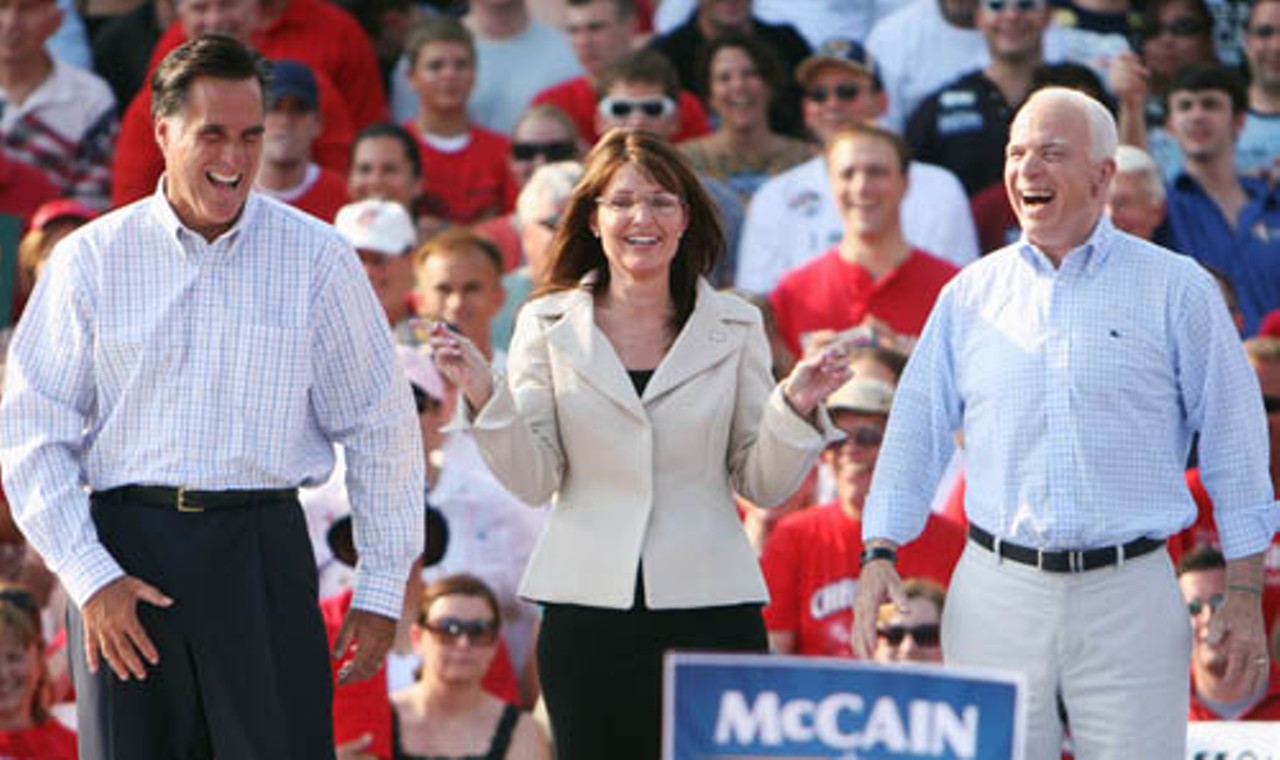 Former Massachusetts Governor Mitt Romney, Alaska Governor and McCain&rsquo;s running mate Sarah Palin, and John McCain shares a laugh while former Arkansas Governor, Mike Huckabee tells a joke.