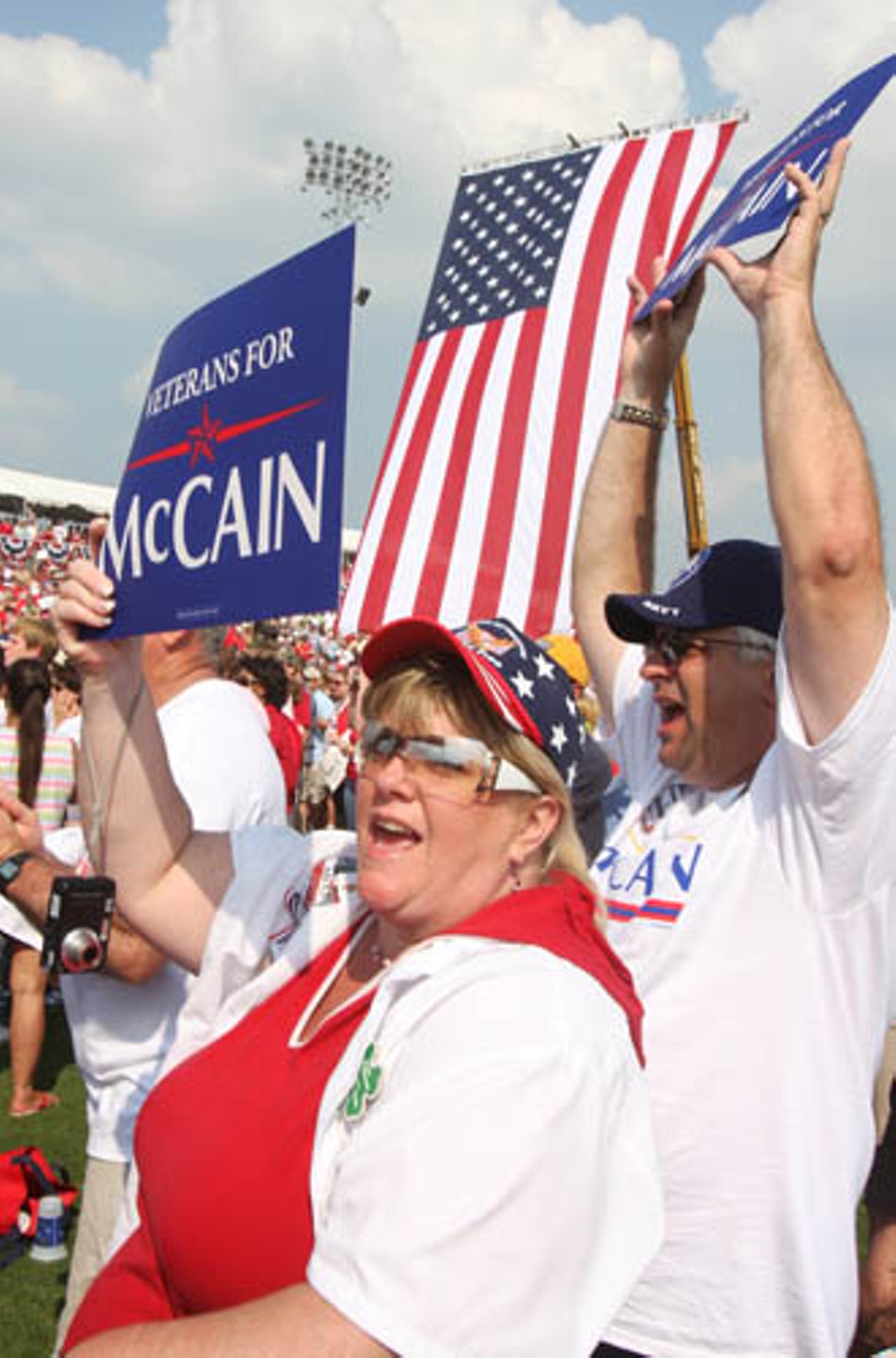 Mark and Mary Dempsey, Minooka, Illinois, show their support for John McCain.