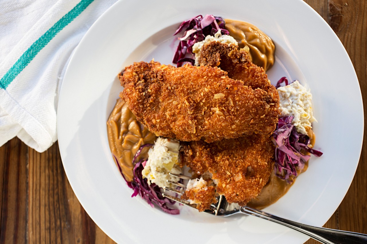 The catfish entree comes encrusted with Zapp's potato chips and is served with sweet potato and red cabbage slaw.