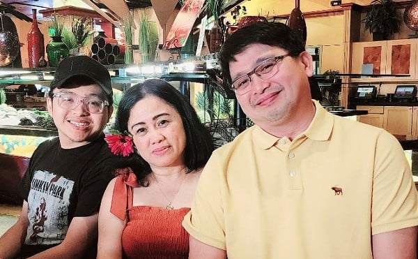 Sally (center) and Randy (right) Arcega with their son Jeross.