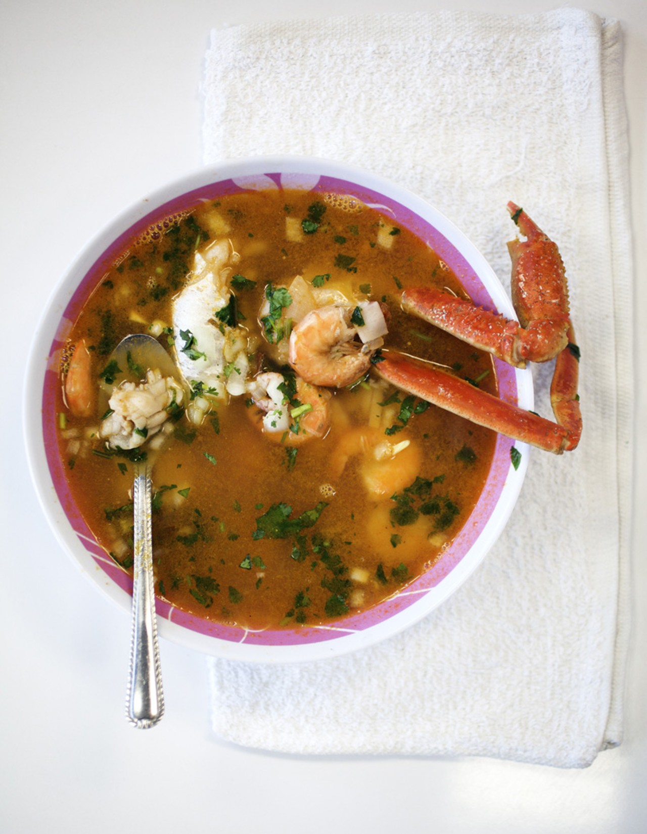 Caldo de Mariscos is a seafood soup that is prepared with shrimp, catfish and crab in a tomato based broth.