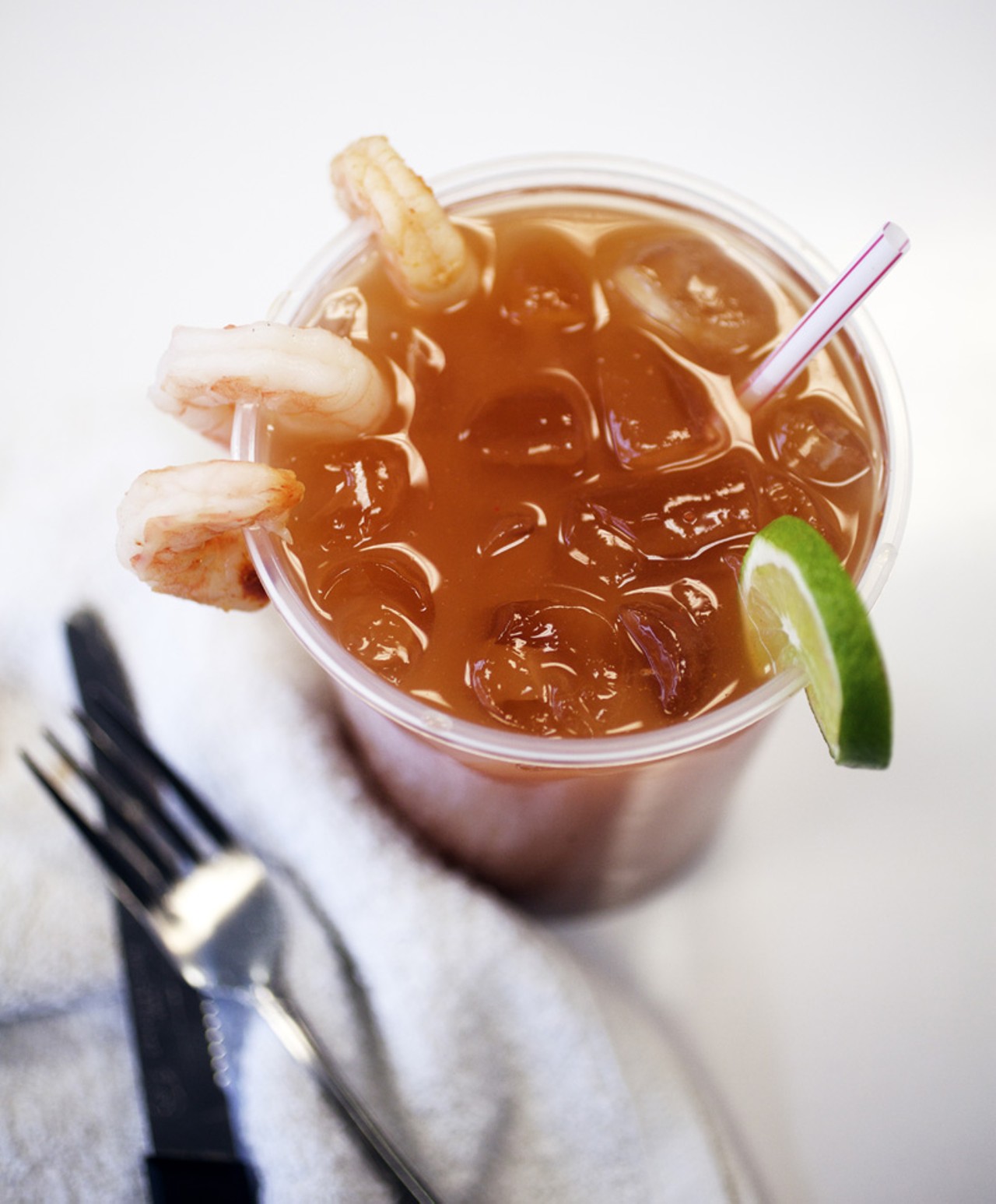 Michelada estilo Mexico is beer, 3 types of powdered chili, salt, lime and shrimp.