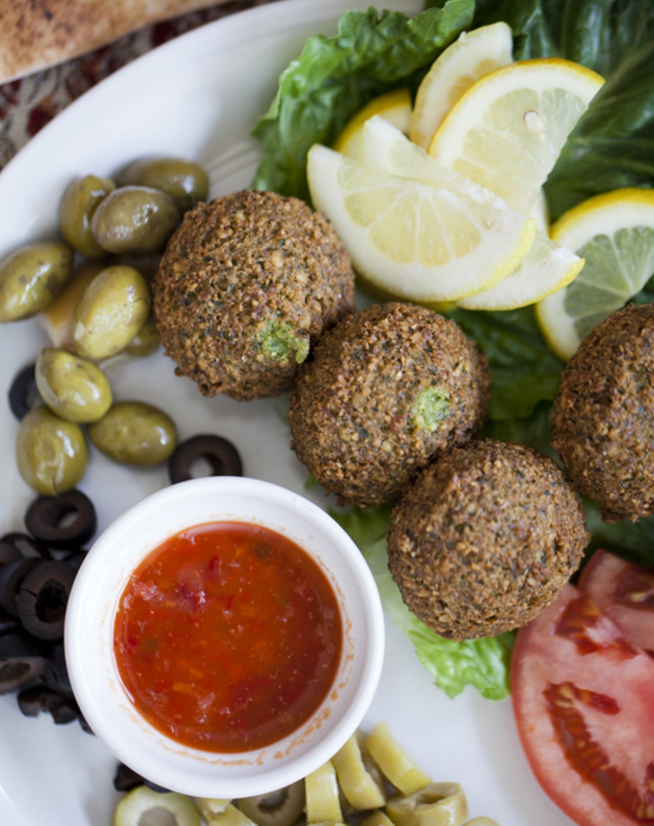 Falafel - lightly fried balls of spiced chickpeas with garlic and parsley.