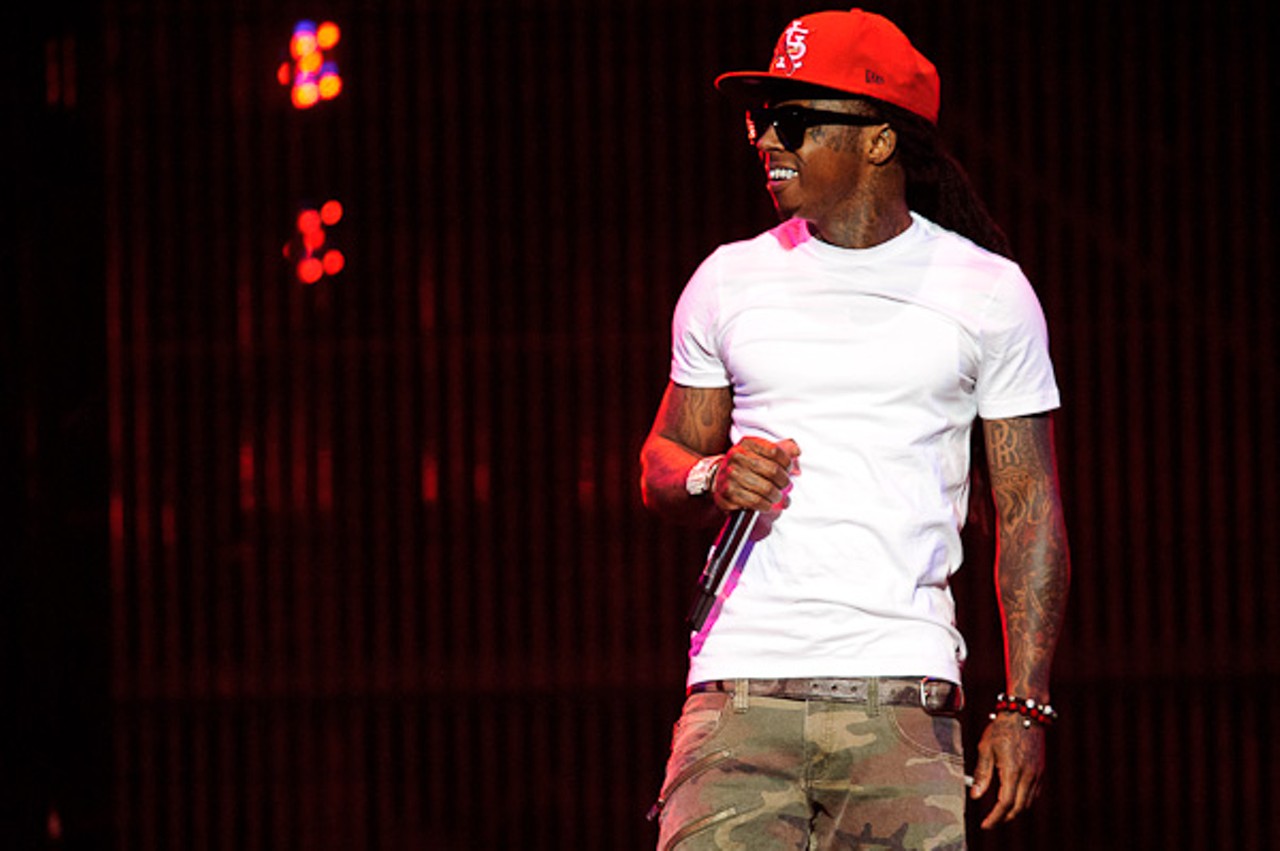 Lil Wayne performing at the Scottrade Center.
