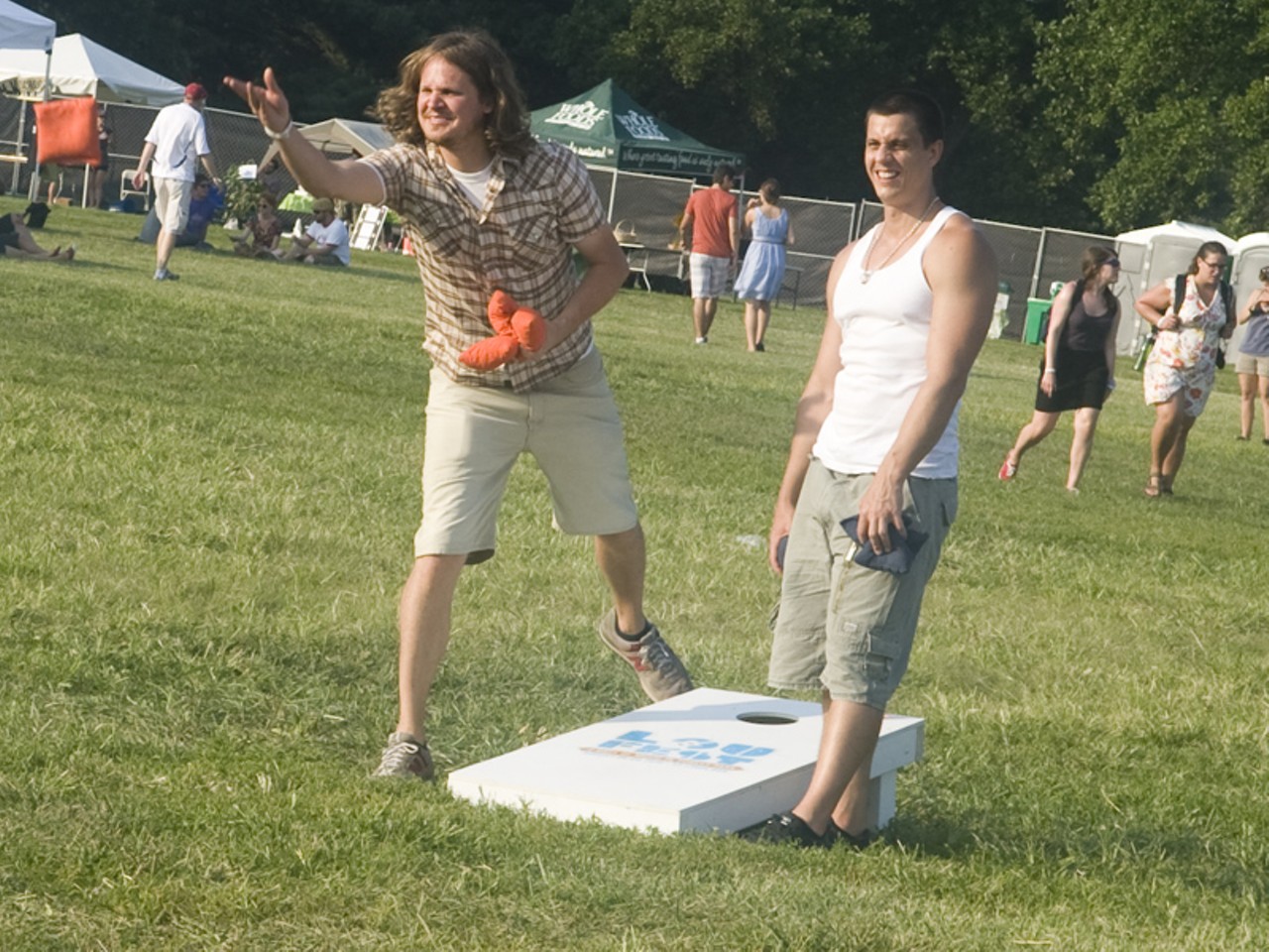LouFest attendees playing a game of Bags.