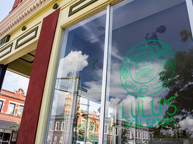Window of Lulu's Local Eatery that shows restaurant's logo.