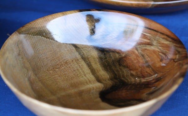 Close of image of a handmade wooden bowl.