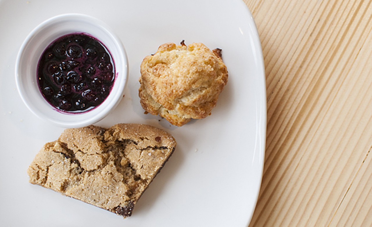 Living Room's gluten-free peanut butter chocolate chip cookie, traditional English scone, and handmade blueberry jam.