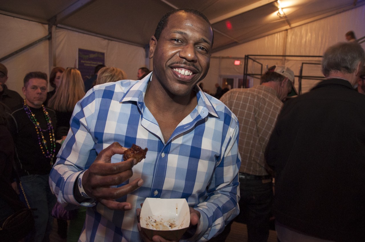 James Perry enjoying the triple smoked Bacon wrapped pork belly or "bacon wrapped bacon."