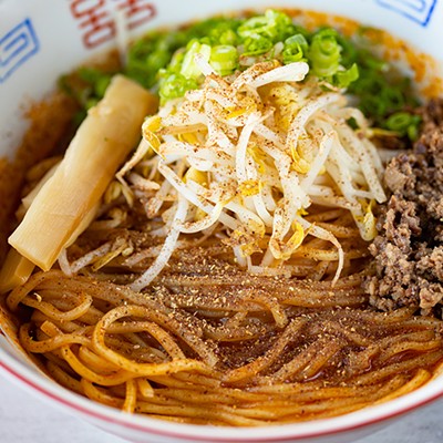 Tantanmen brothless with thick noodles tossed in chili oil, sesame paste and house shoyu, topped with ground pork, menma, scallion and bean sprouts.