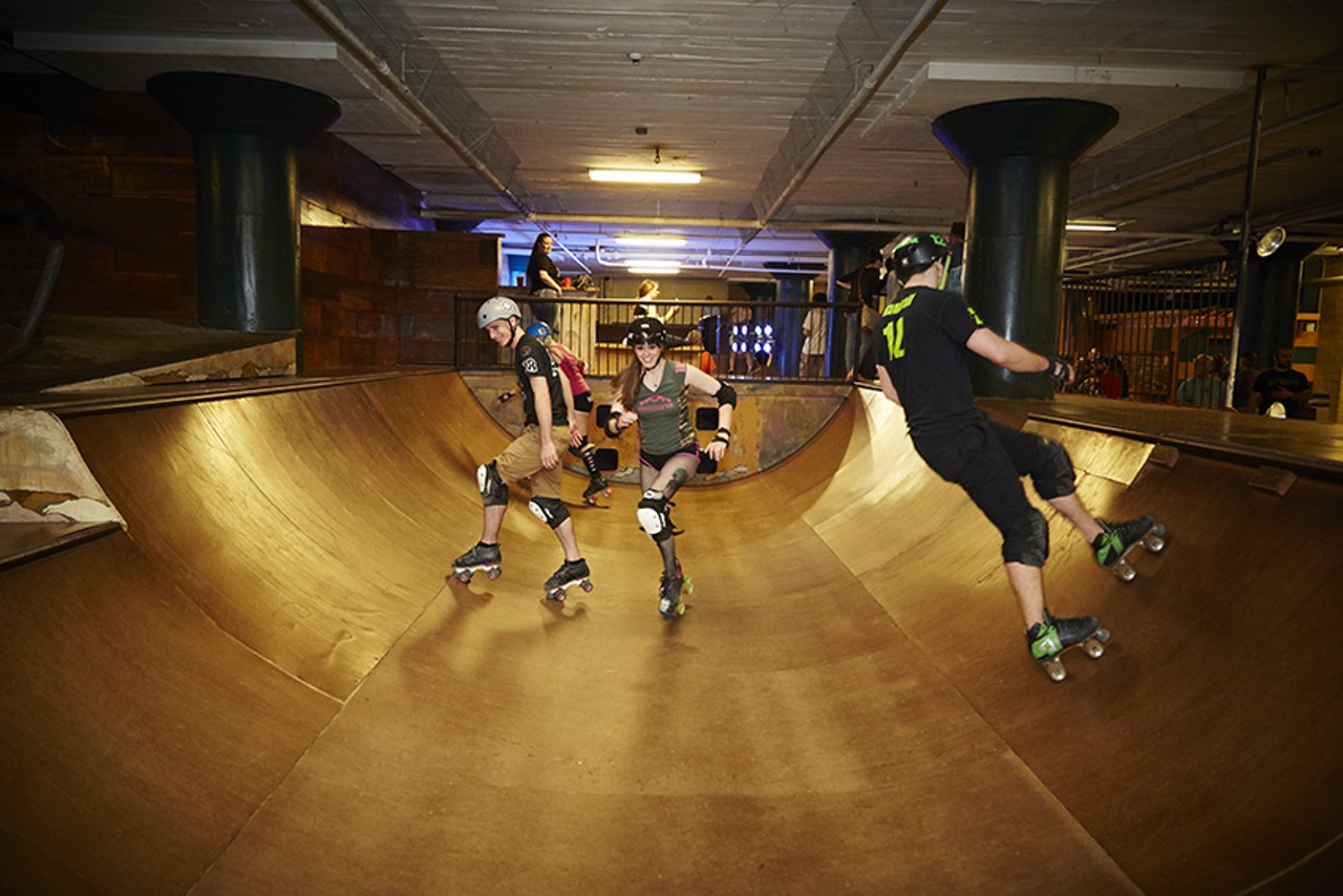 Skaters from the Arch Rival Roller Girls and the St. Louis Gators work on their moves.