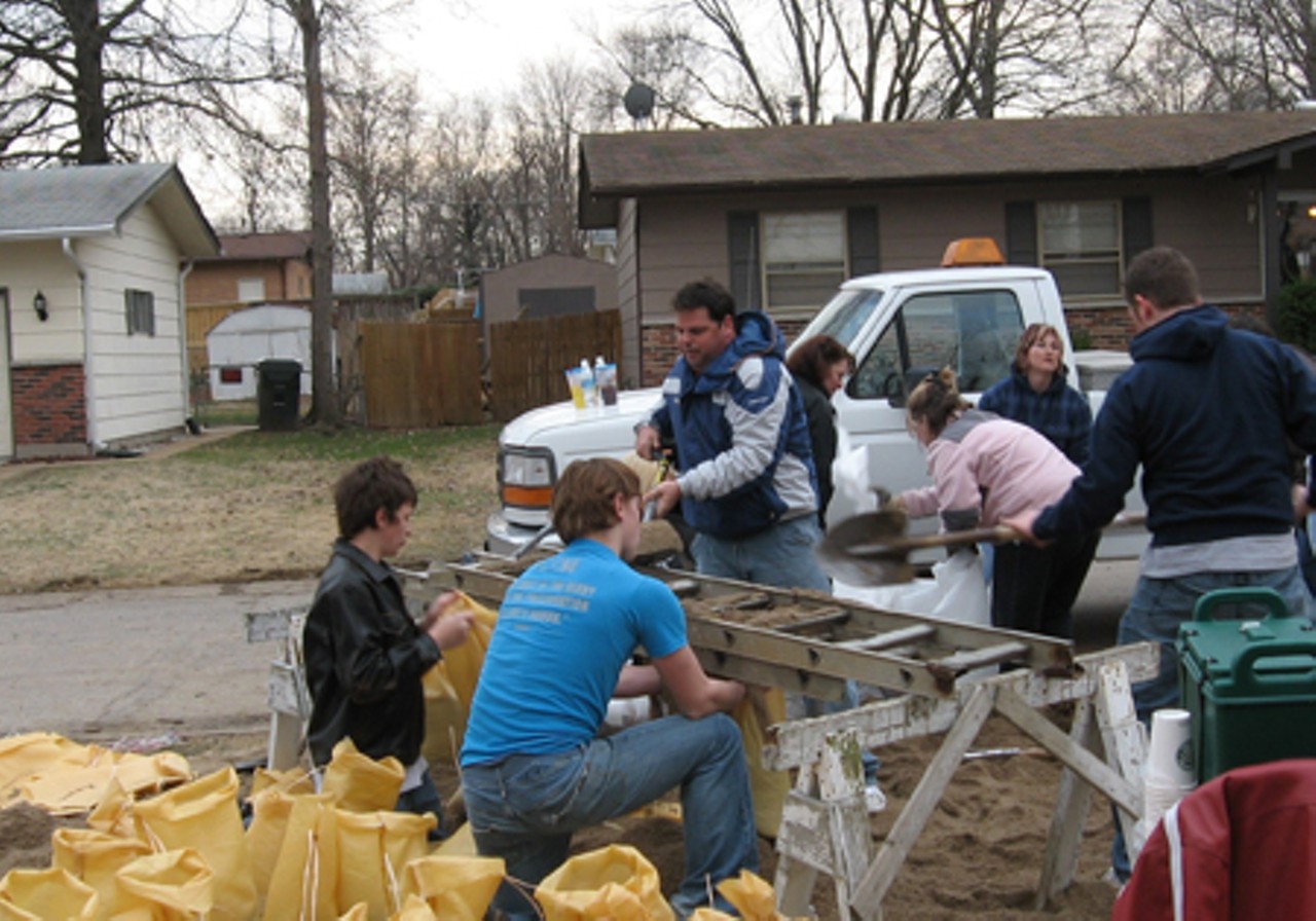 On Friday, March 21, 2008 there were 100 volunteers at the site and 60 should up the next day. The residents believe that they would have lost their housed without the help of their neighbors.