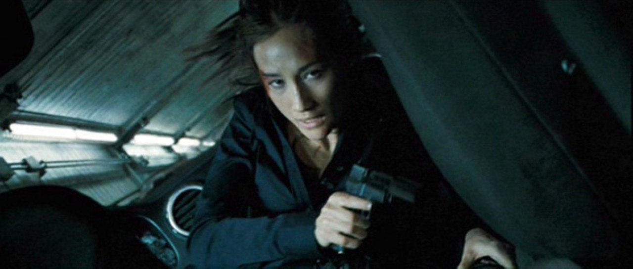 Chinese cyber-terrorist (read: hacker) Mai Linh (Maggie Q), also dies because of a vehicular fire, at the end of Live Free or Die Hard. (It makes you glad to take the subway.) But this time, McClane almost goes down as well, when the SUV he uses to run Linh down falls into an elevator shaft and dangles there. After a struggle, and some sexual tension, McClane knocks Linh out cold and high-tails it just in time. The SUV falls to the bottom of the elevator shaft and -- of course -- explodes. For something so Boston-bleak, and set on the Eastern Seabord, an accent's required. New title? Pahk the Cah and Die Hahd.