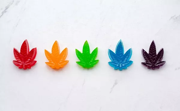 THC-infused gummies in the shape of a cannabis plant.