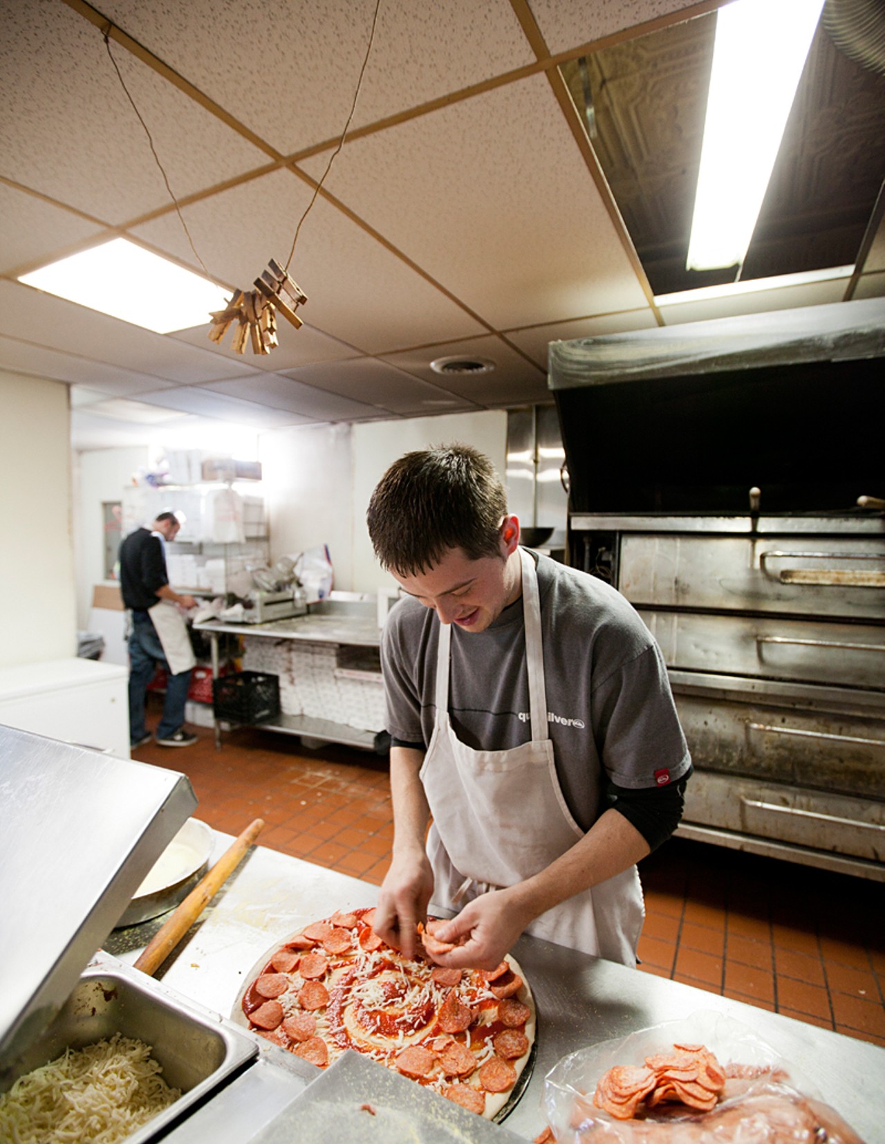 Brother of the owner, Jasmin Islamovic, at work in the kitchen of Mr. X's.