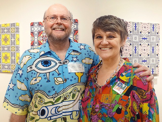 William Harroff (left) and his wife, Charlotte Johnson stand in front of their artwork.