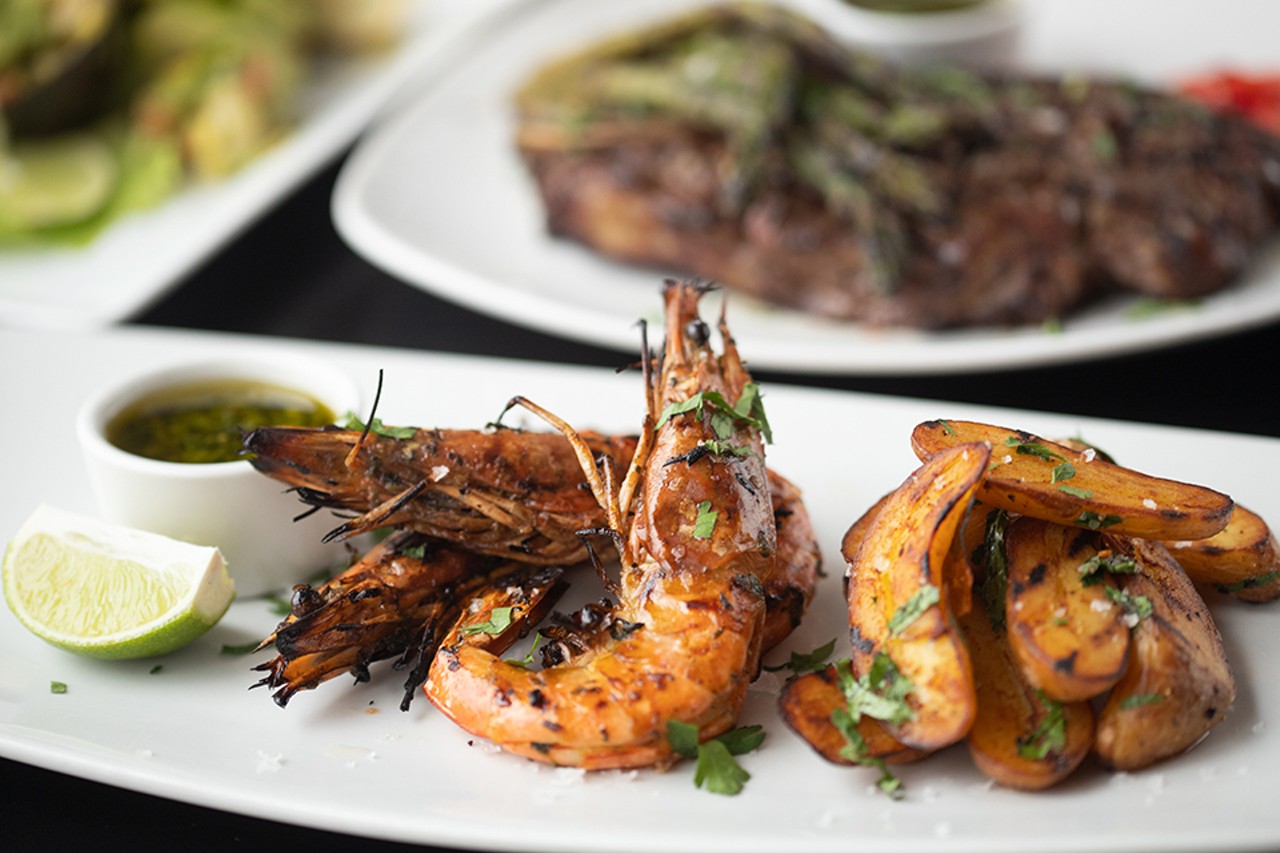 Langostinos a la parrilla, or grilled chimichurri prawns with fingerling potatoes.