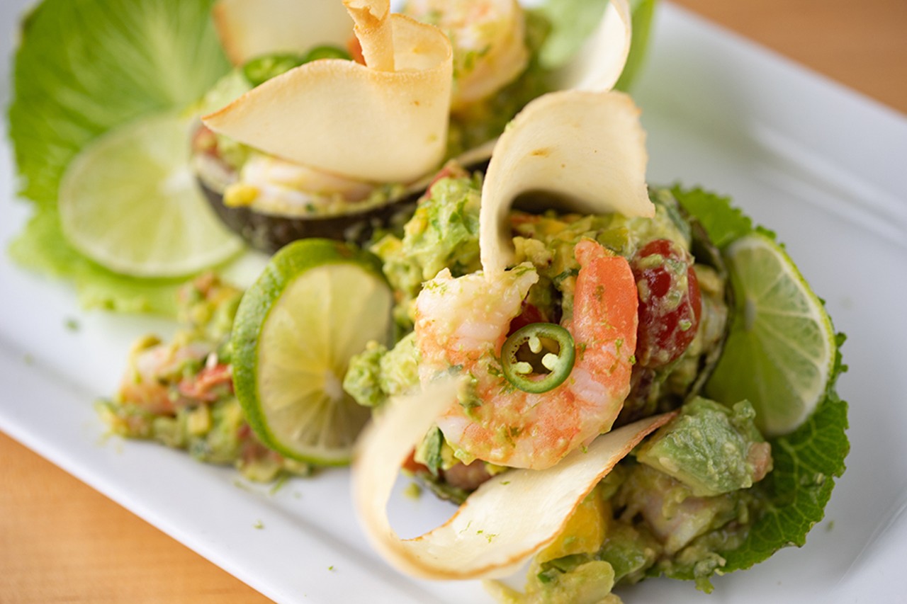 Aguacate relleno con camarones, or avocado with shrimp, served with yucca chips.