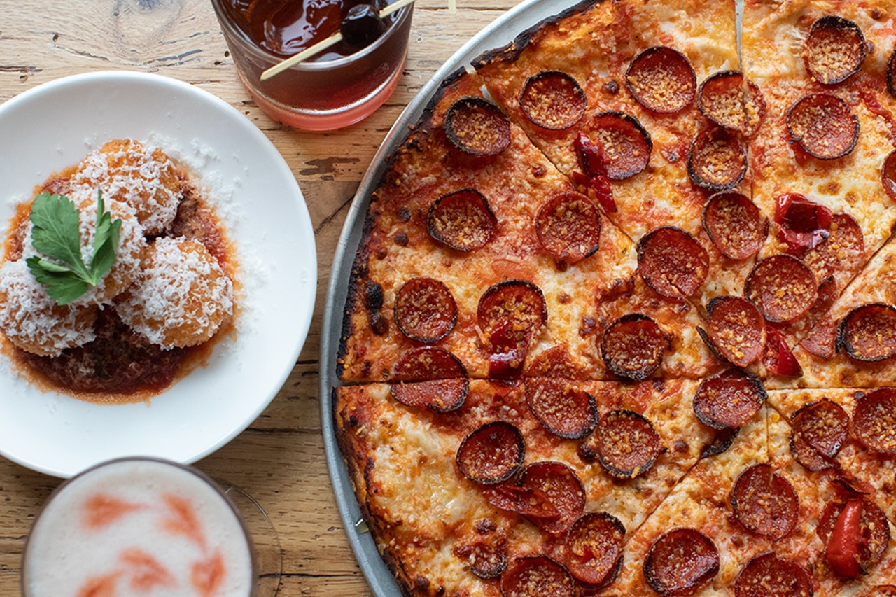 A selection of items from O+O Pizza: arancini, cocktails and the OG pepperoni pizza.