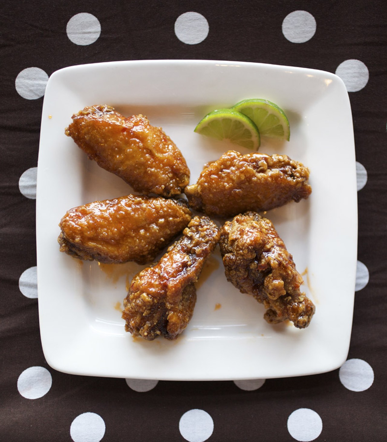 Wings with the Thai Chile-Lime sauce, which is a southwest Asian inspired sauce combining lime, cilantro and a slow building heat.