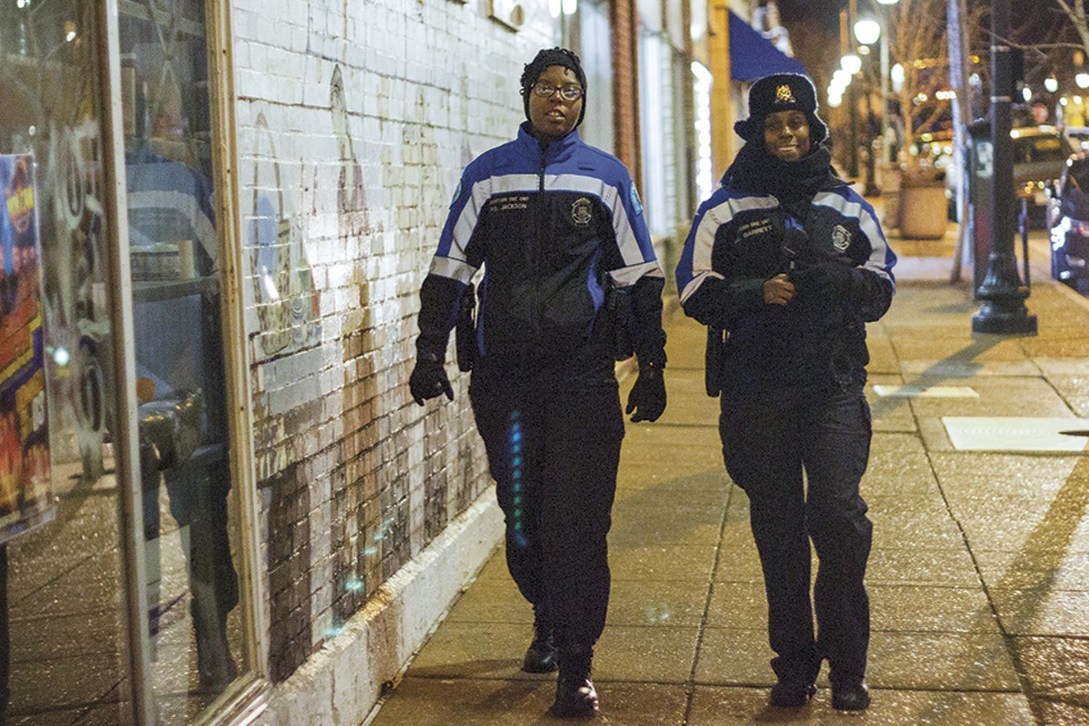 On duty on a cold night, officers Devin Guajardo (left) and Jazmon Garrett serve as the SLMPD's anchors on Cherokee Street.