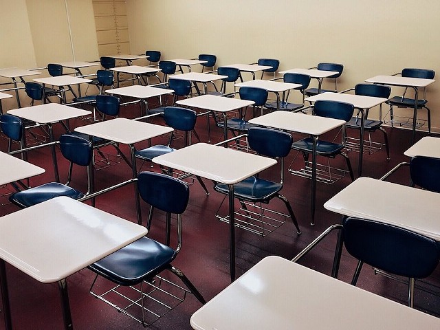Desks in an empty classroom.