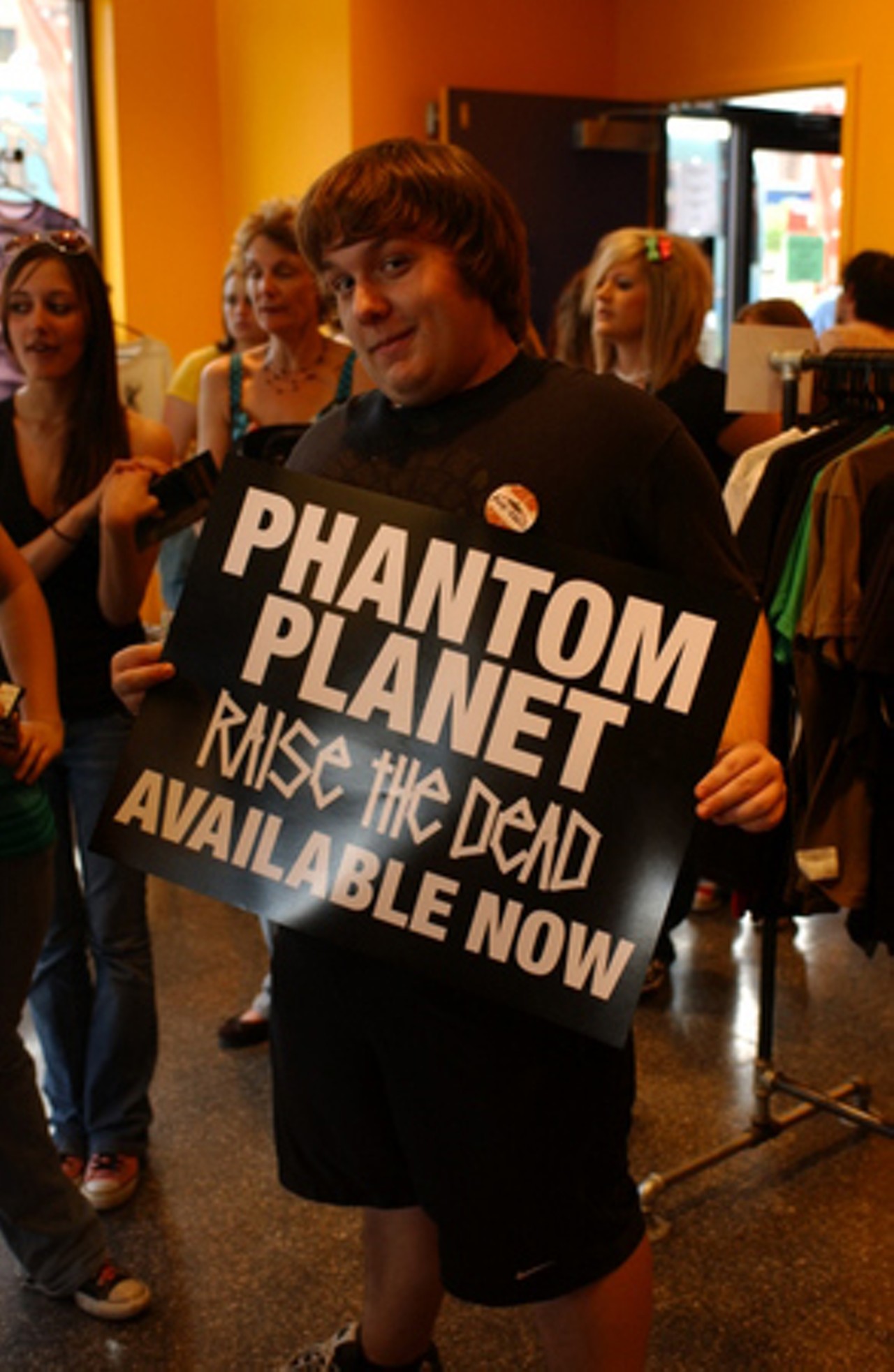 Bryan Carter shows his support for Phantom Planet while getting some merch.