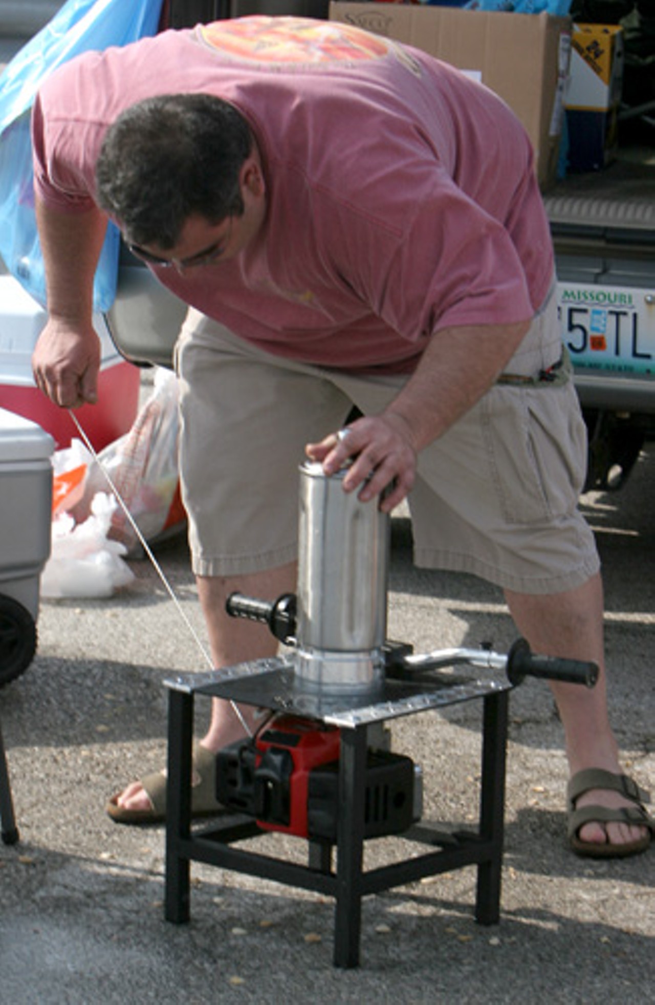 Kevin Zerr starts up his gas powered blender.
