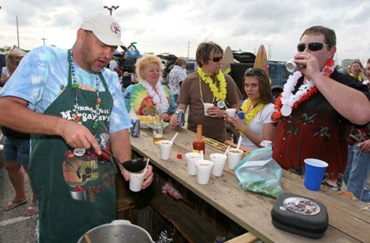 Ryan and Julia Brown offer their homemade gumbo to Buffett fans for no cost.