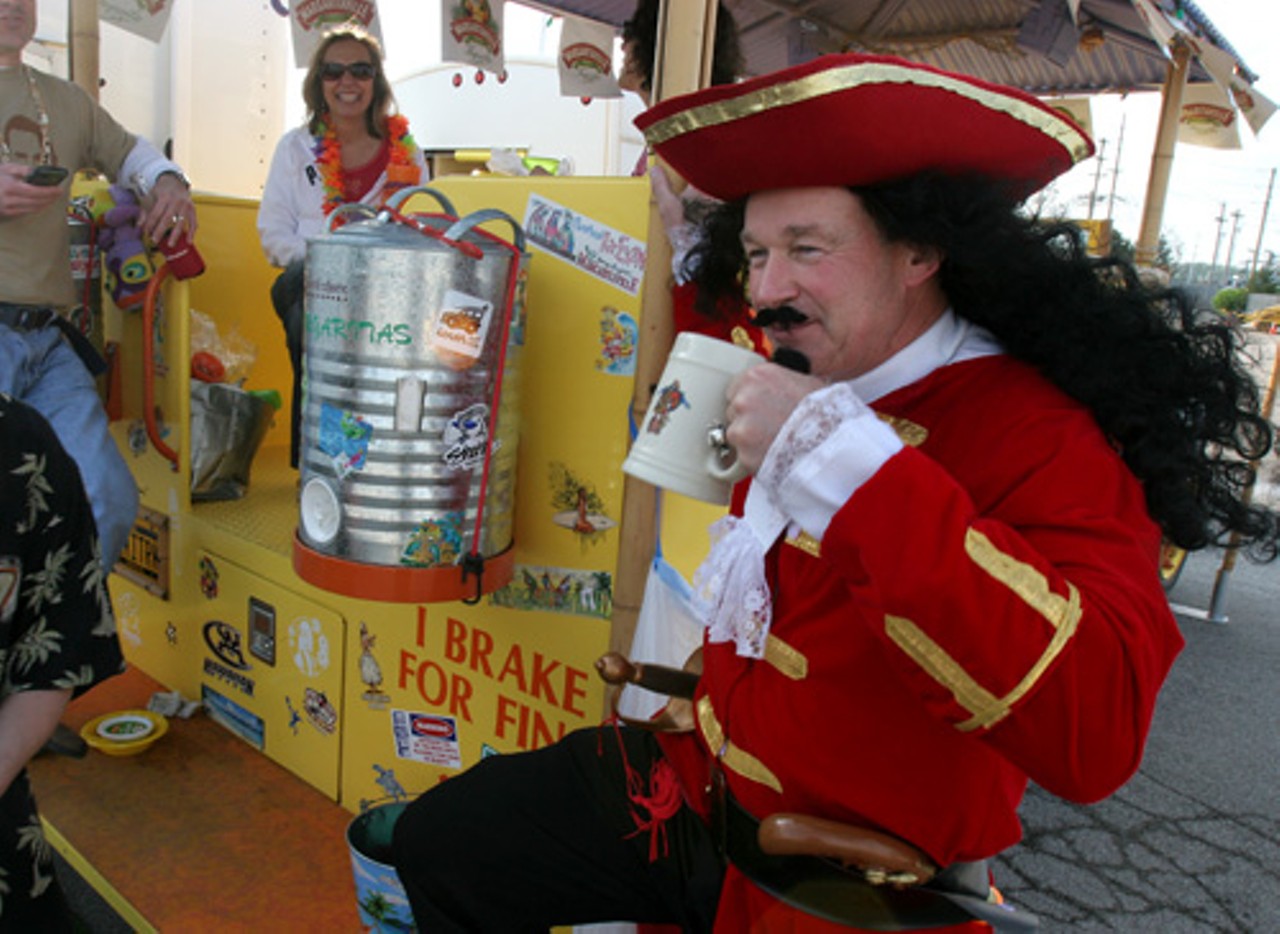Reed Carlson, dressed as Captain Morgan, leans on his &ldquo;Tiki Truck&rdquo; vehicle, transported from Decorah, Iowa.