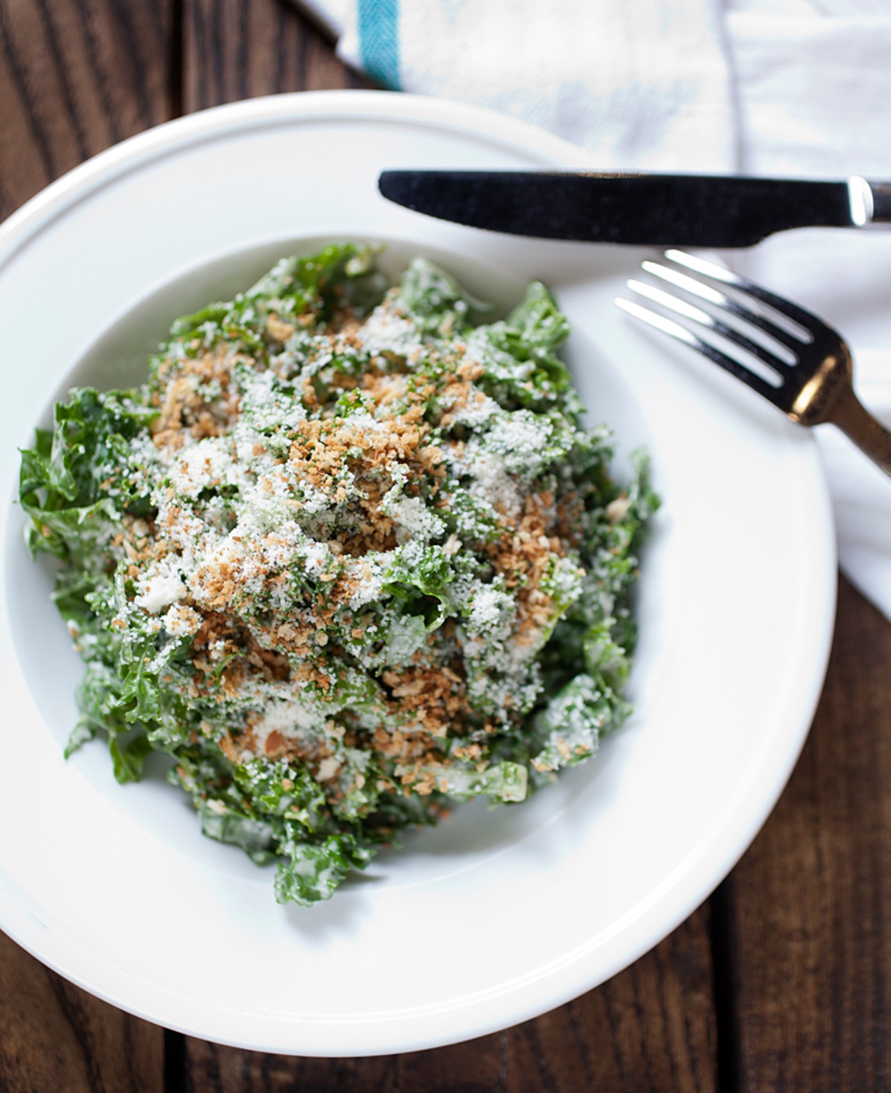 Shaved kale salad with creamy anchovy dressing, pecorino and breadcrumbs.
