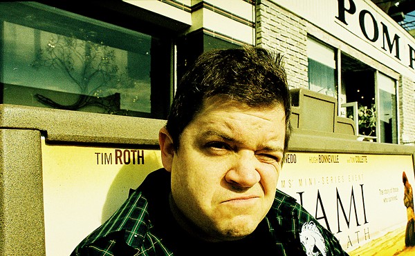 Patton Oswalt frowns at the camera.