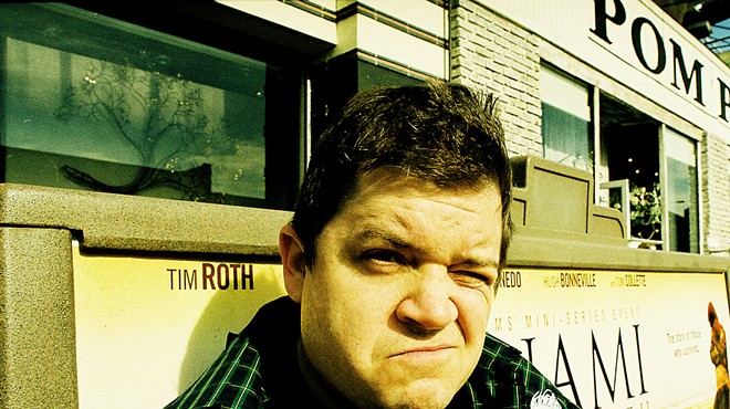 Patton Oswalt frowns at the camera.