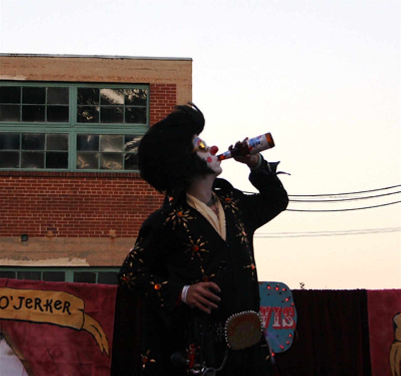 Clownvis -- the party's MC -- gets down with a cool one after giving a PBR PSA.