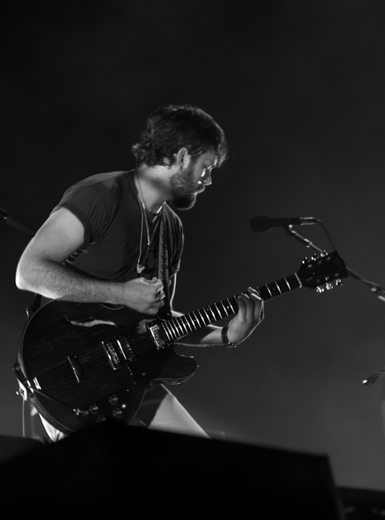 Kings of Leon performing in St. Louis at the Verizon Wireless Amphitheater.