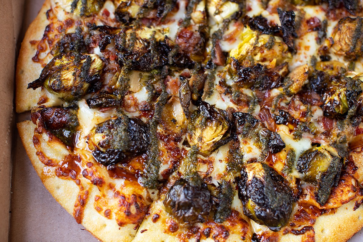 Glendale pizza with mozzarella, smoked gouda, Brussels sprouts, bacon, caramelized onions, pesto and chipotle glaze.