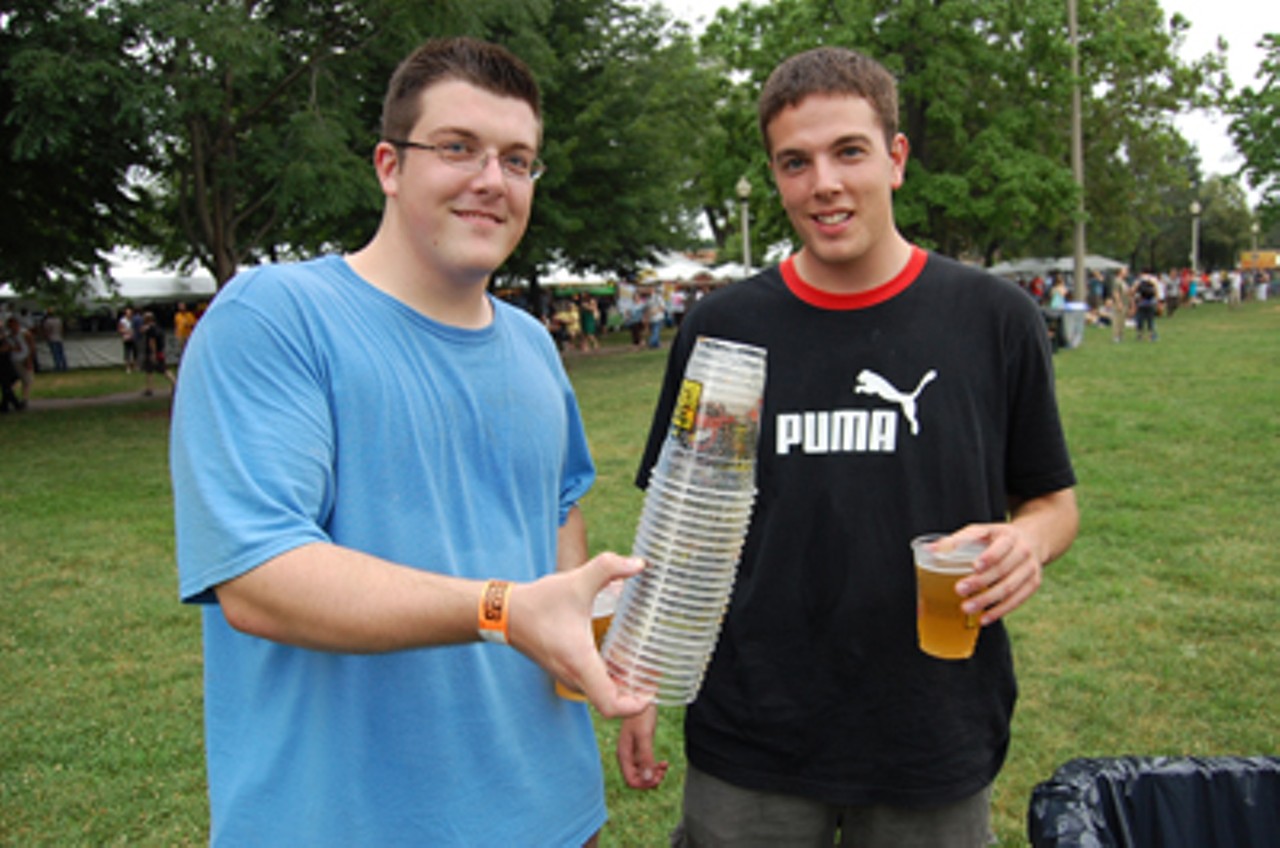 Ten plastic cups equaled free Pitchfork Music Festival merch. These guys were digging through trash cans.