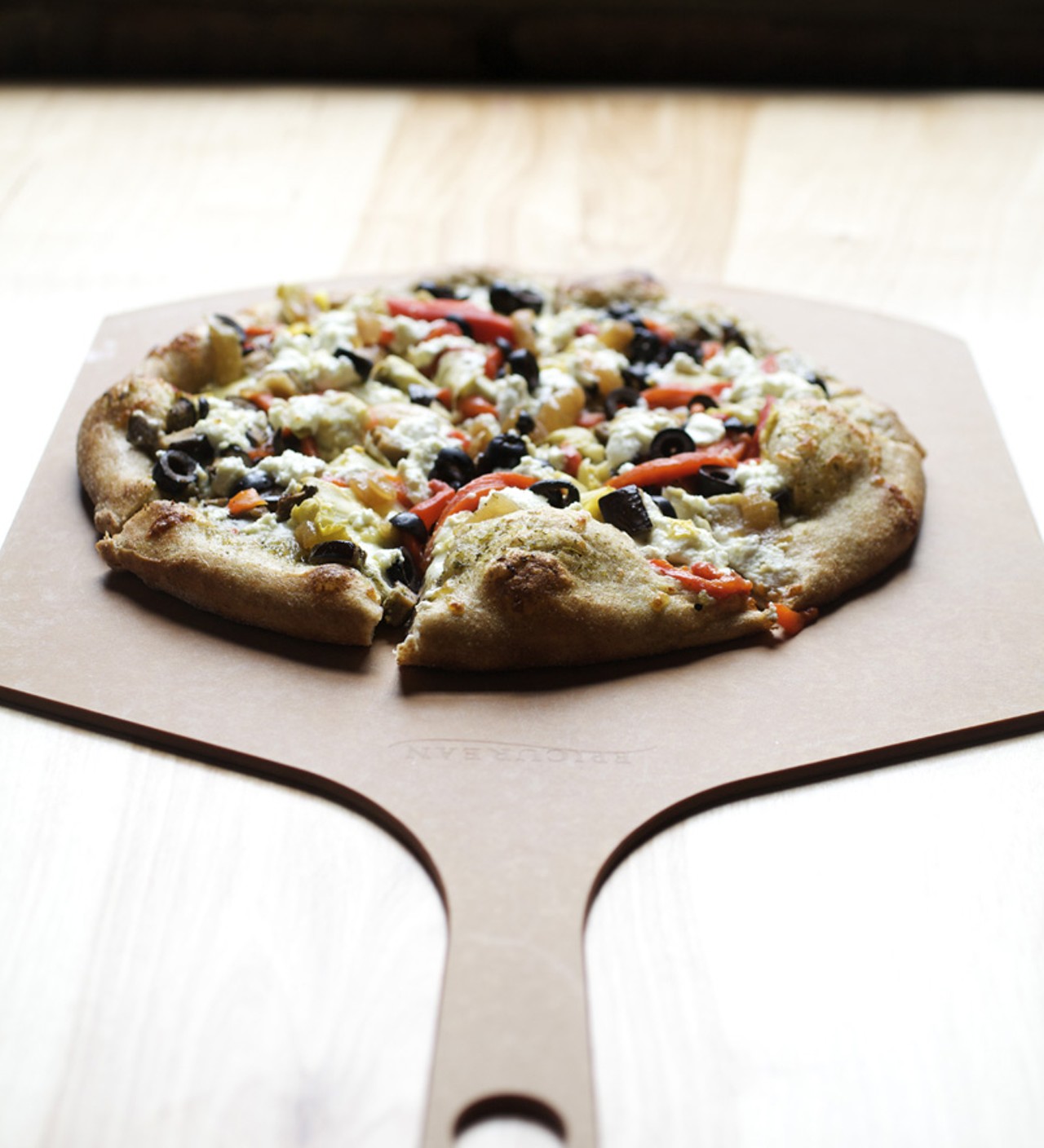 The Vegged Out Pizza, also available on either the PW Original, Honey Wheat or Gluten Free crust, is prepared with chimichurri, roasted eggplant, roasted red pepper, artichoke heart, caramelized onion, black olive, mozzarella & goat cheese.